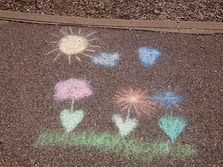 Picture of a flower chalk drawing made my little girls.